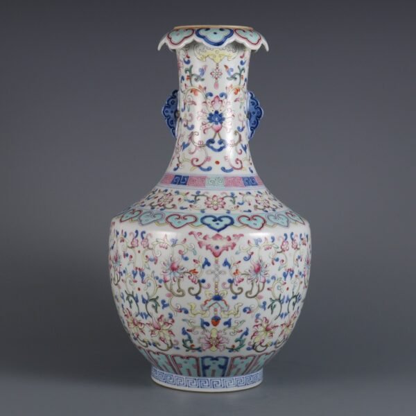 Qing Dynasty Qianlong period blue and white with pink enamel lotus double-ear flower mouth vase