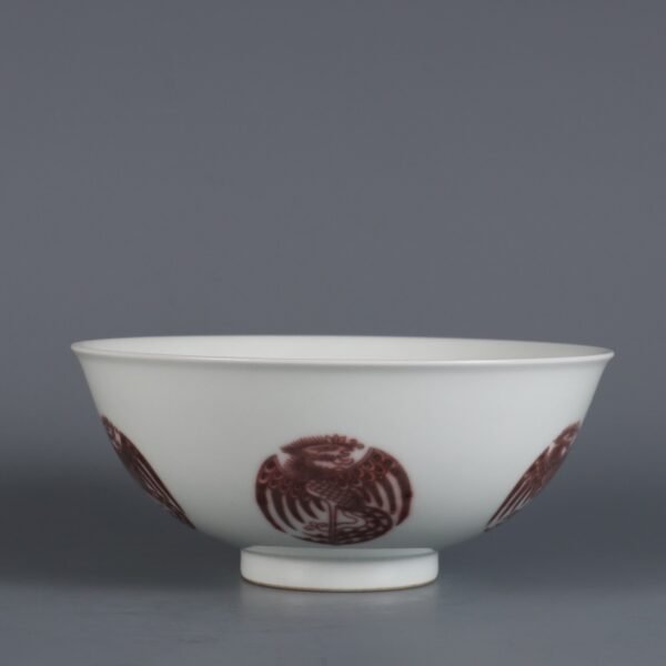 Qing Dynasty Qianlong period underglaze red round phoenix pattern bowl