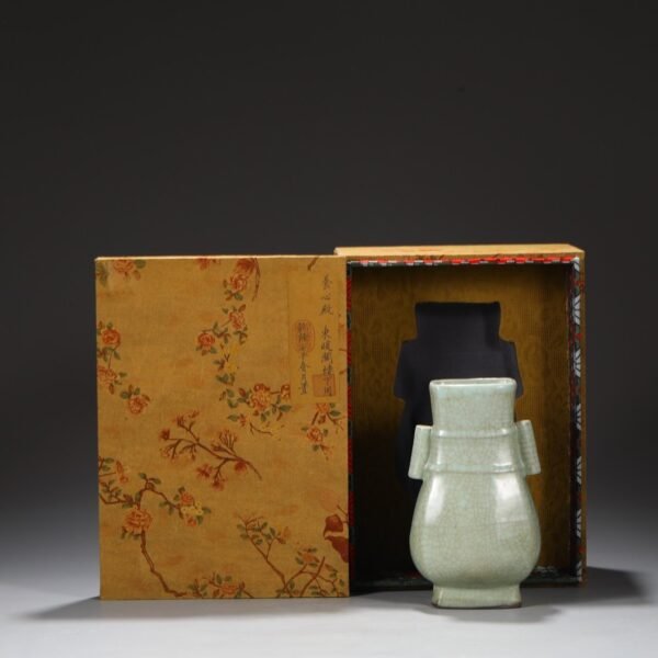 An old Southern Song Dynasty imperial green-glazed square-shaped bottle with pierced ears, "Yingtai"