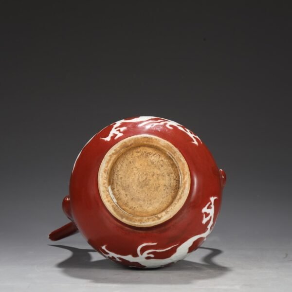 A large red-glazed pot with dragon patterns carved in white from the Yuan Dynasty. - Image 5