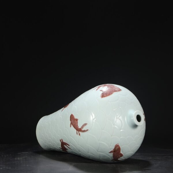 A large plum vase with a lid and underglaze red carved with water wave and fish pattern from the Yuan Dynasty. - Image 6