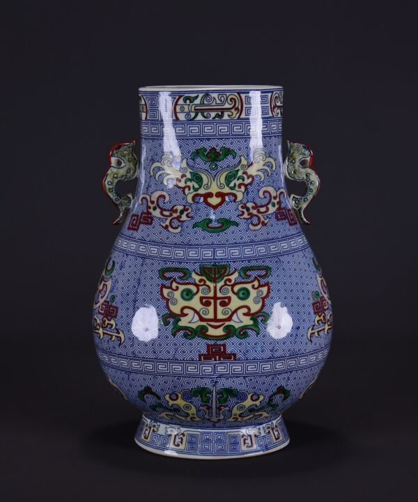 old collection of a Qing Dynasty Qianlong Doucai animal face pattern Guan Erzun