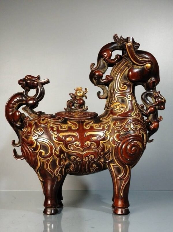 Auspicious animal ornament made of copper and gold
