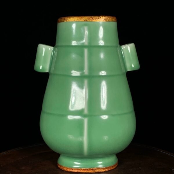 Song Dynasty Longquan kiln plum green glaze mouth-opening jar