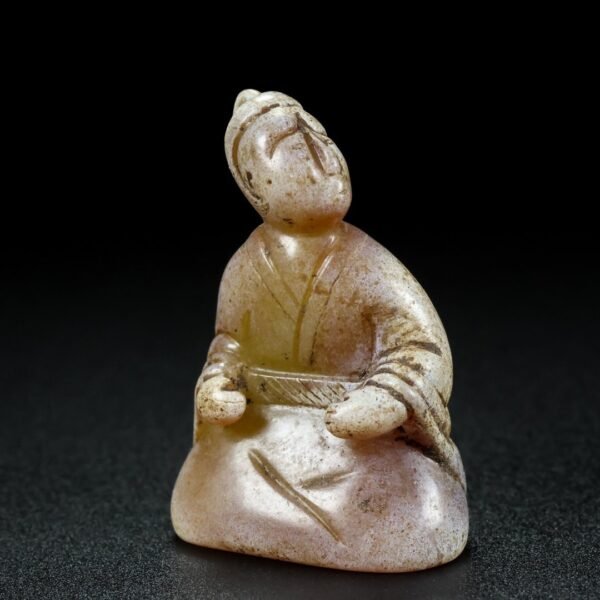 Jade figurine made from Hetian mountain materials. The jade is rigid and the carving is sharp