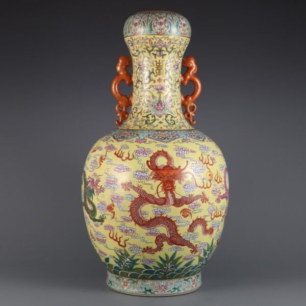 Large vase with yellow ground and double dragon handles in pastel-colored cloud and dragon patterns