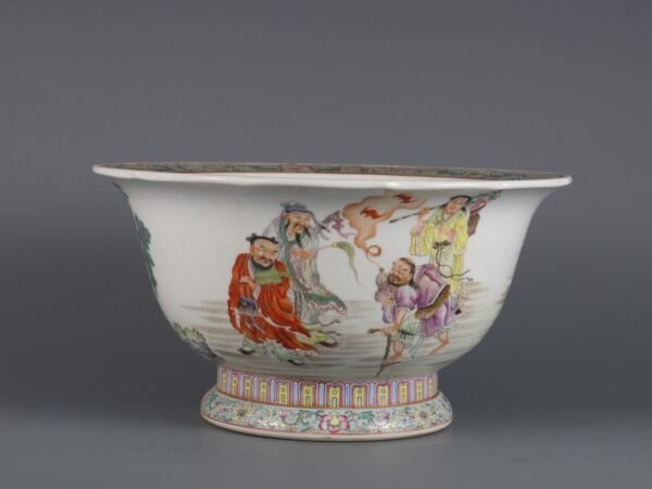 Made in the Daoguang Period of the Qing Dynasty a pink-glazed flowerpot with eight immortals