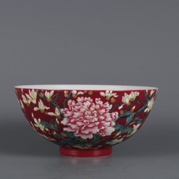 A palace bowl with magnolia flower pattern on a rouge-red ground and gilded enamel