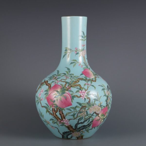 Qing Dynasty Qianlong period turquoise green ground pink nine peach pattern celestial globe vase