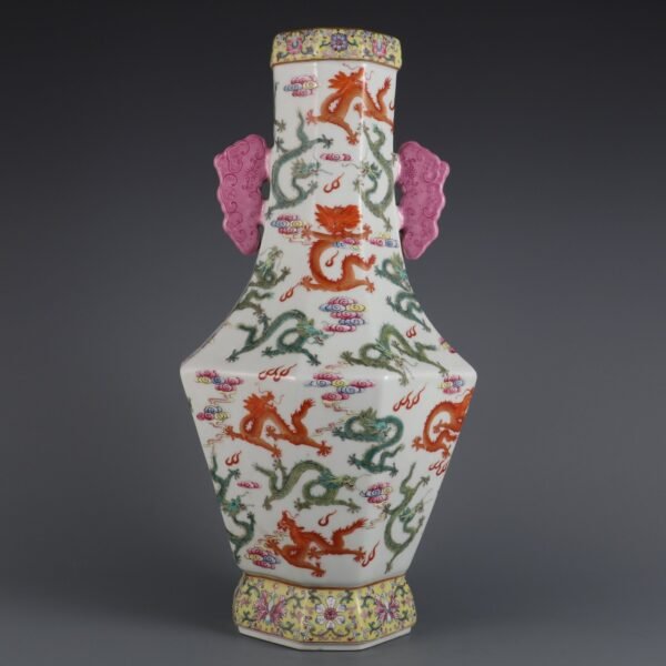 Qing Dynasty Qianlong period pink enamel cloud dragon pattern double handle octagonal vase
