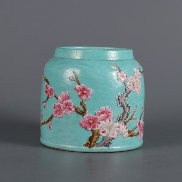 Qing Dynasty Qianlong period turquoise green glaze with colored carving of a plum blossom washbasin