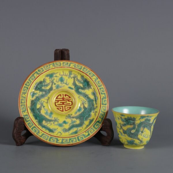 Qing Dynasty Qianlong Period Yellow Ground Green Color Double Dragon Holding Longevity Cup