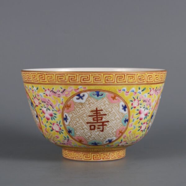 Qing Tongzhi Period Yellow Ground Famille Rose Wanshou Wujiang Palace Bowl