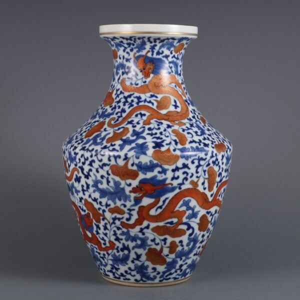 Qing Dynasty Qianlong period blue and white alum red gold winding dragon pattern vase