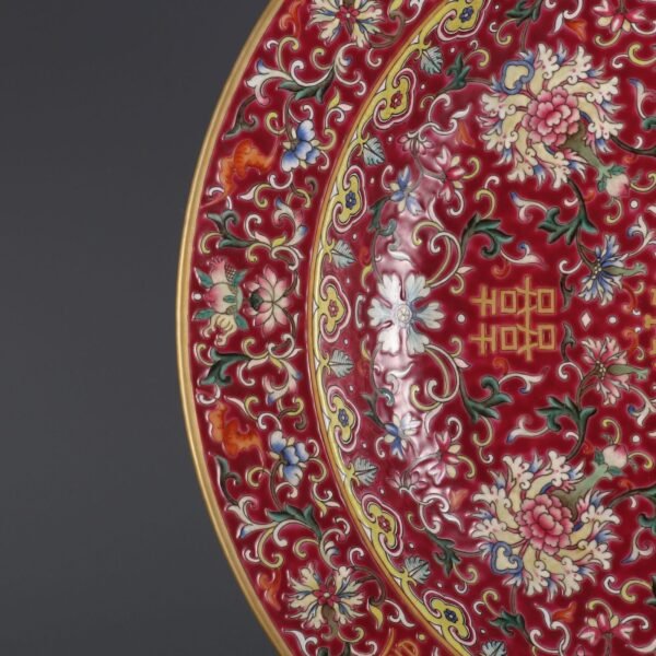 A large plate with a folded rim and rouge-red ground, enamel passionflower and gold-painted - Image 3