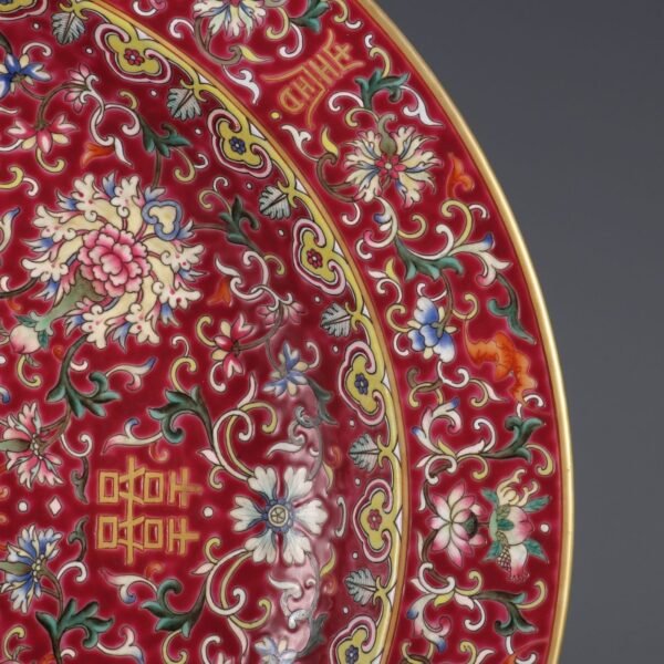 A large plate with a folded rim and rouge-red ground, enamel passionflower and gold-painted - Image 6