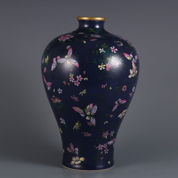 Qing Dynasty Qianlong period blue glaze with pink butterfly pattern plum vase